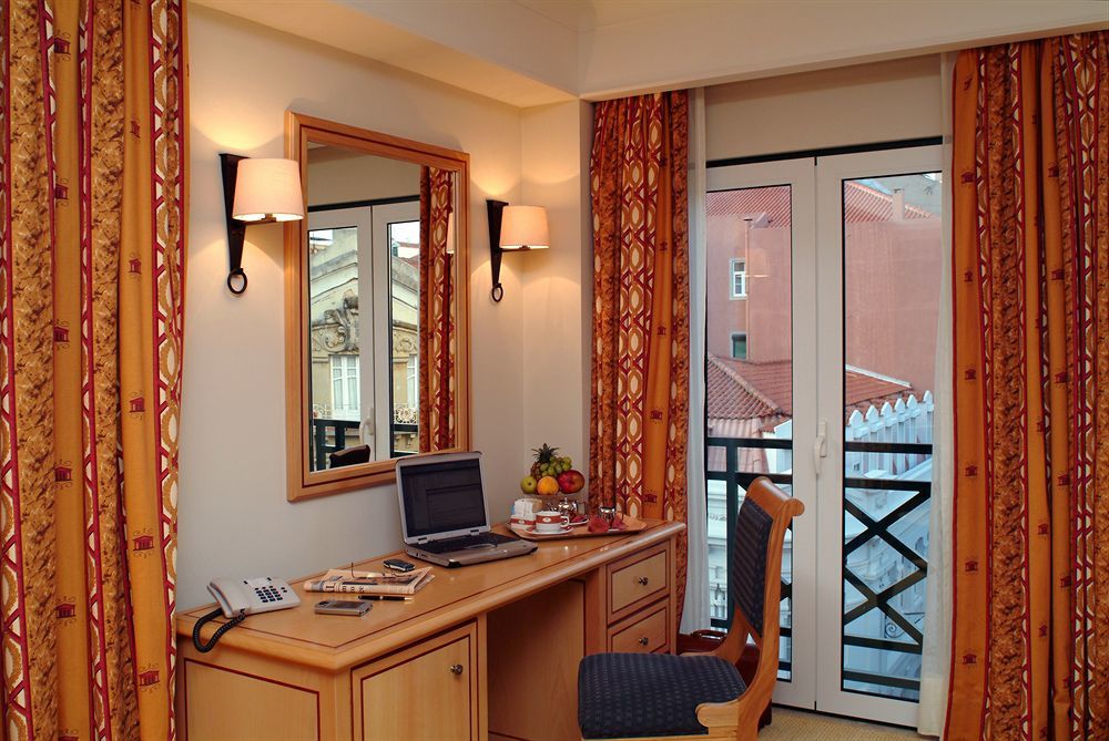 Hotel Real Palacio Lisboa Exterior foto A typical room at the hotel